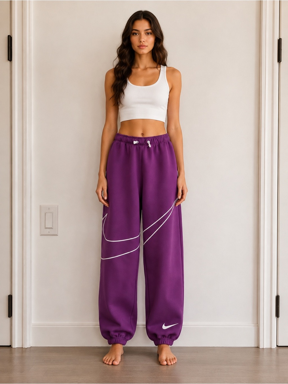 Nike Women's Purple Wide-Leg Track Pants with White Swoosh Lines
